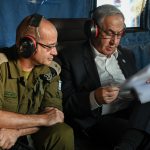 Prime Minister Benjamin Netanyahu and the military secretary are in a helicopter on their way to assess the security situation. Photo: Maayan Tuaf, Government Press Office